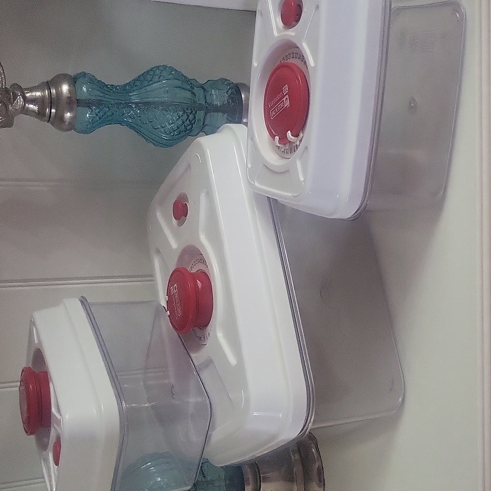 Clear and White Storage Containers with Red Accents